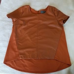 Short sleeve shirt with faux leather front